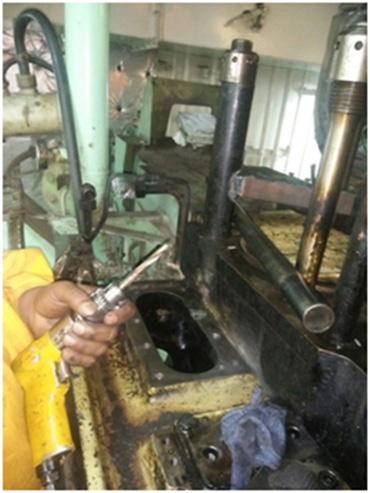 Repair of Threads On Engine Block Under Process